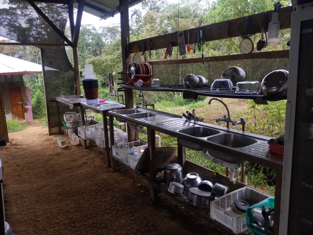 Photo of an outdoor kitchen with four sinks